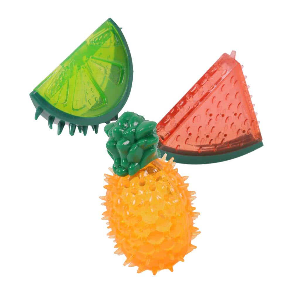 Toy shaped like a pineapple, lime, watermelon on a white background