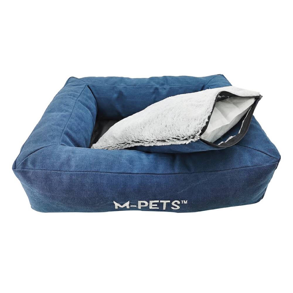 Blue pet bed with white interior on a white background, featuring the brand 'M-Pets'.